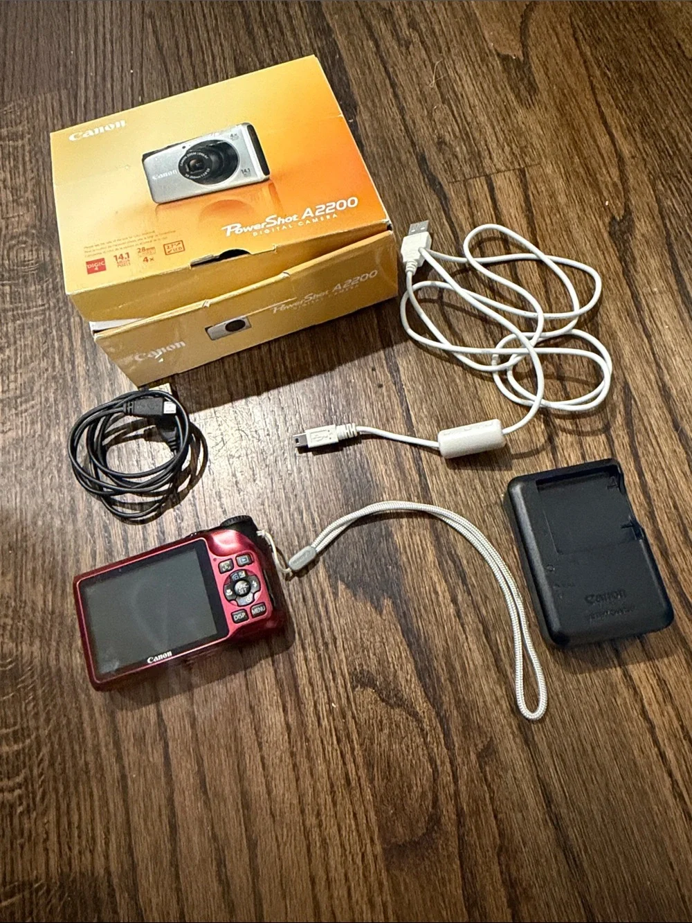 Canon PowerShot A2200 Digital Camera with Charger and Cables